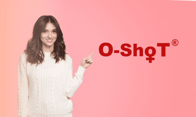 2679365 (1) Woman smiling pointing at O-shoT logo on pink background for performance pain and sports medicine centers.