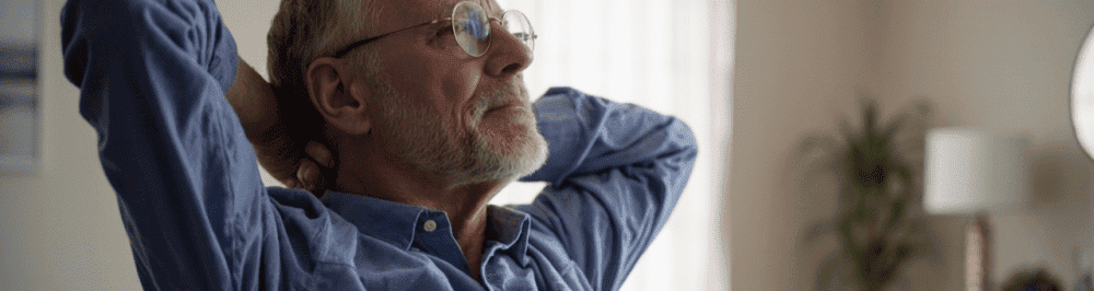 Patient experiencing neck pain at Performance Pain and Sports Medicine clinic.