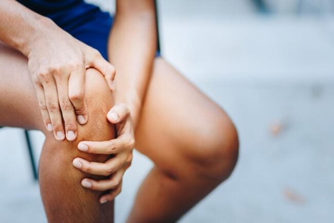2408564 Knee pain relief in sports medicine clinic, professional treatment for sports injuries, expert knee injury management, rehabilitation services for athletes, pain management for sports-related knee issues.